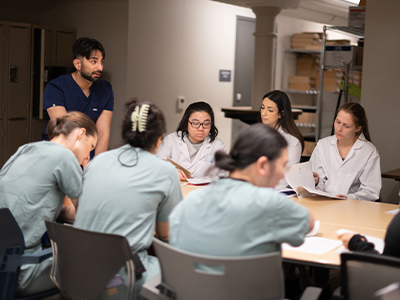 Dr. Abbas Jessani and students prepare for community visits.